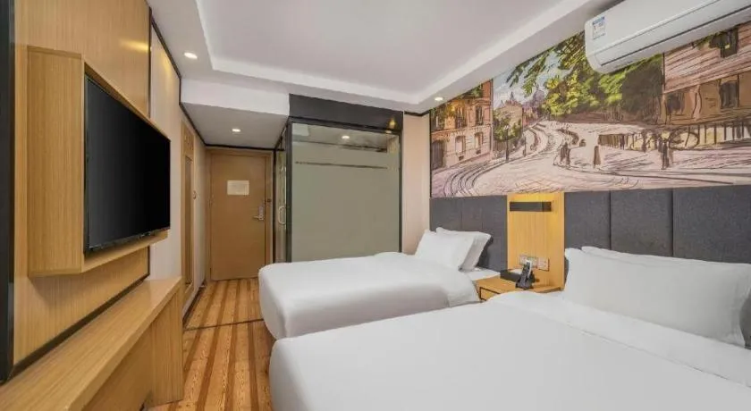 Bed in Yimi Hotel Guangzhou Sport College Branch