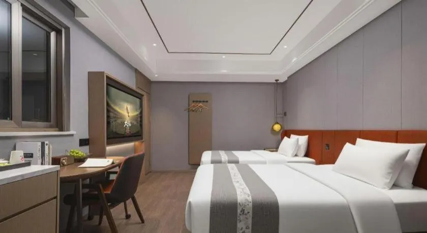 Bed in PAI Hotel·Chengdu Jintang Huaikou Huaizhou Avenue