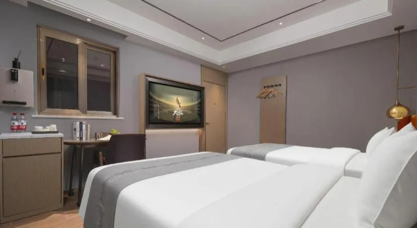 Bed in PAI Hotel·Chengdu Jintang Huaikou Huaizhou Avenue