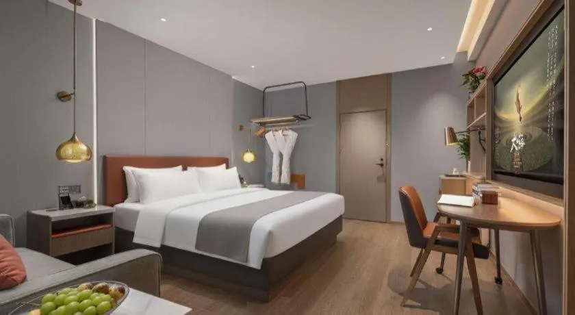 Bed in PAI Hotel·Chengdu Jintang Huaikou Huaizhou Avenue