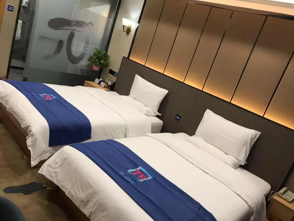 Bed in PAI Hotel·Chengdu Jintang Huaikou Huaizhou Avenue