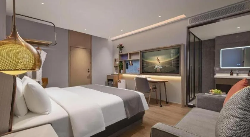 Bed in PAI Hotel·Chengdu Jintang Huaikou Huaizhou Avenue