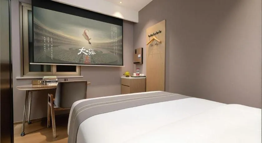 Bed in PAI Hotel·Chengdu Jintang Huaikou Huaizhou Avenue