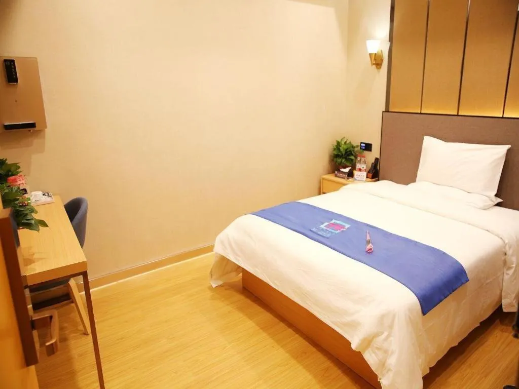 Bed in PAI Hotel·Chengdu Jintang Huaikou Huaizhou Avenue