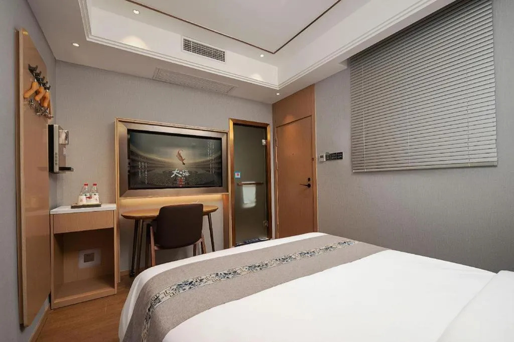 Bed in PAI Hotel·Chengdu Jintang Huaikou Huaizhou Avenue