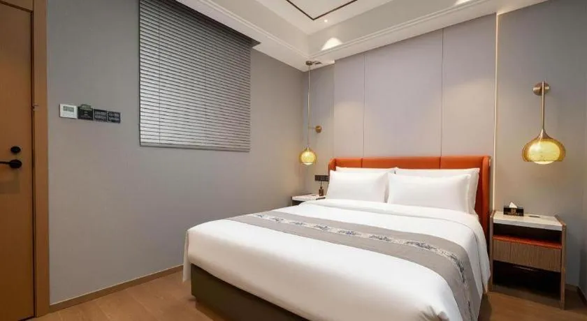 Bed in PAI Hotel·Chengdu Jintang Huaikou Huaizhou Avenue