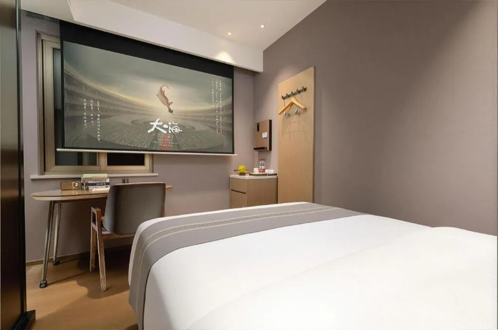 Bed in PAI Hotel·Chengdu Jintang Huaikou Huaizhou Avenue