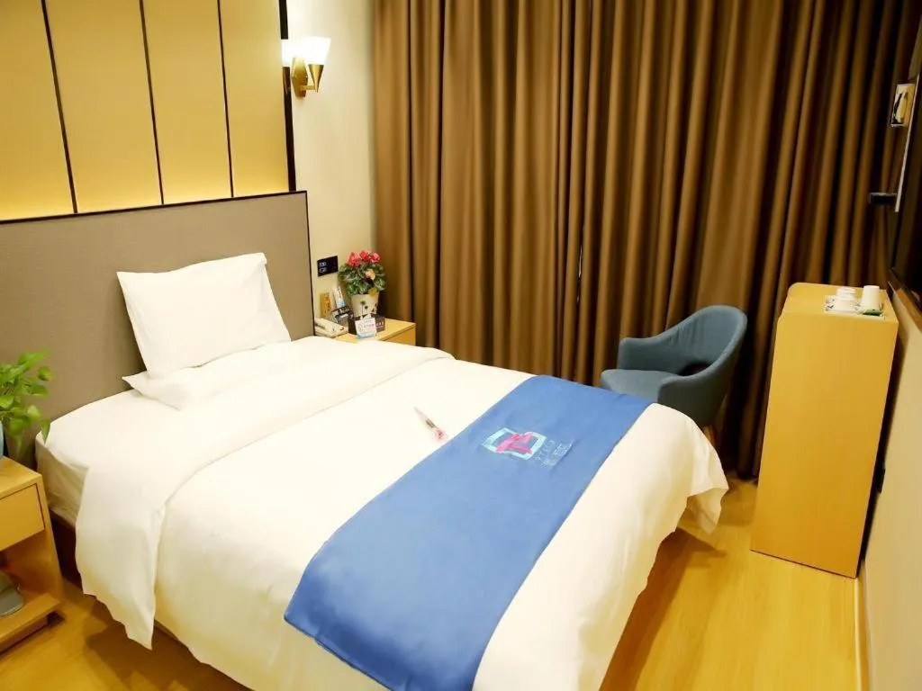 Bed in PAI Hotel·Chengdu Jintang Huaikou Huaizhou Avenue