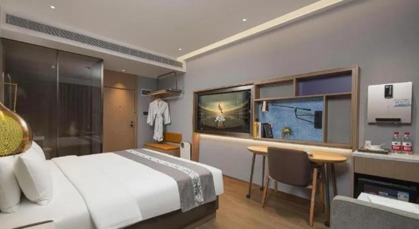 Bed in PAI Hotel·Chengdu Jintang Huaikou Huaizhou Avenue
