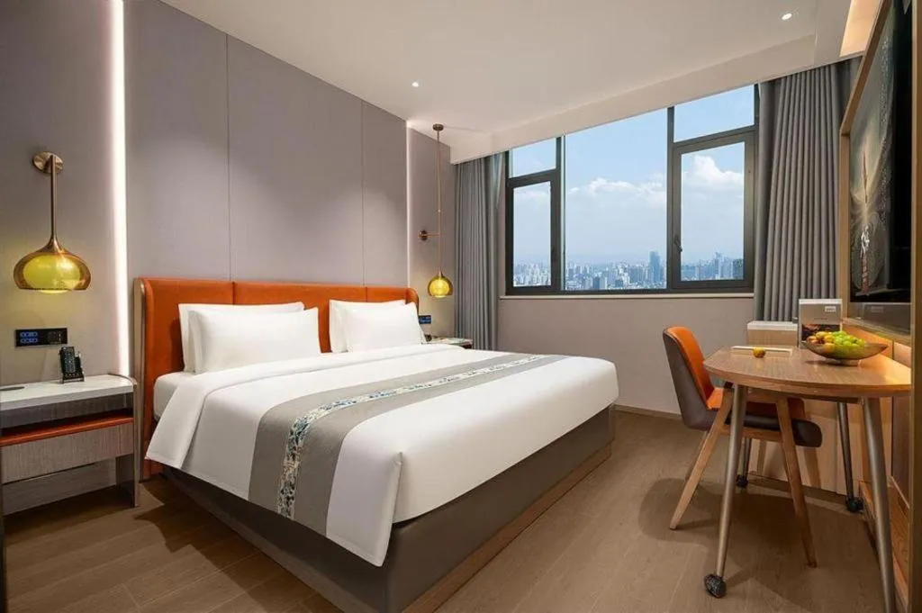 Bed in PAI Hotel·Chengdu Jintang Huaikou Huaizhou Avenue