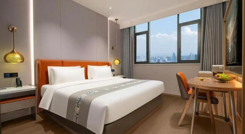 Bed in PAI Hotel·Chengdu Jintang Huaikou Huaizhou Avenue