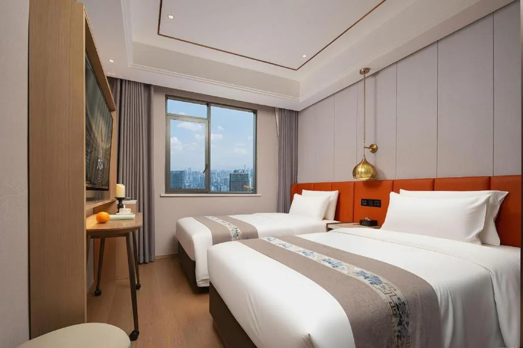 Bed in PAI Hotel·Chengdu Jintang Huaikou Huaizhou Avenue