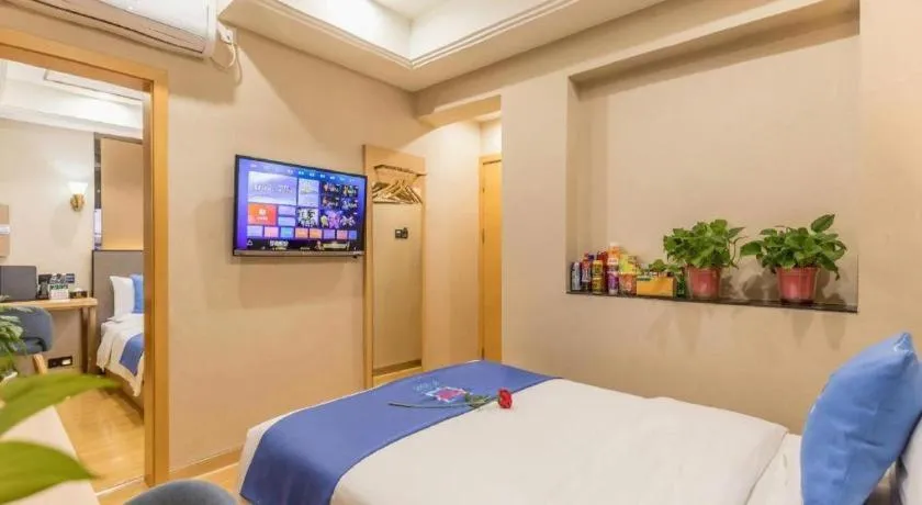 Bed in PAI Hotel·Chengdu Jintang Huaikou Huaizhou Avenue