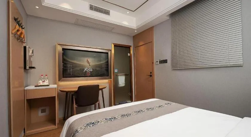 Bed in PAI Hotel·Chengdu Jintang Huaikou Huaizhou Avenue