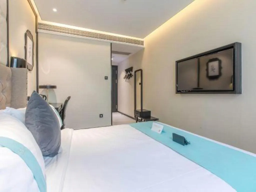 Bed in Xana Hotelle Shaghai Hongqiao Hub National Exhibition Center Qibao Lianming Road