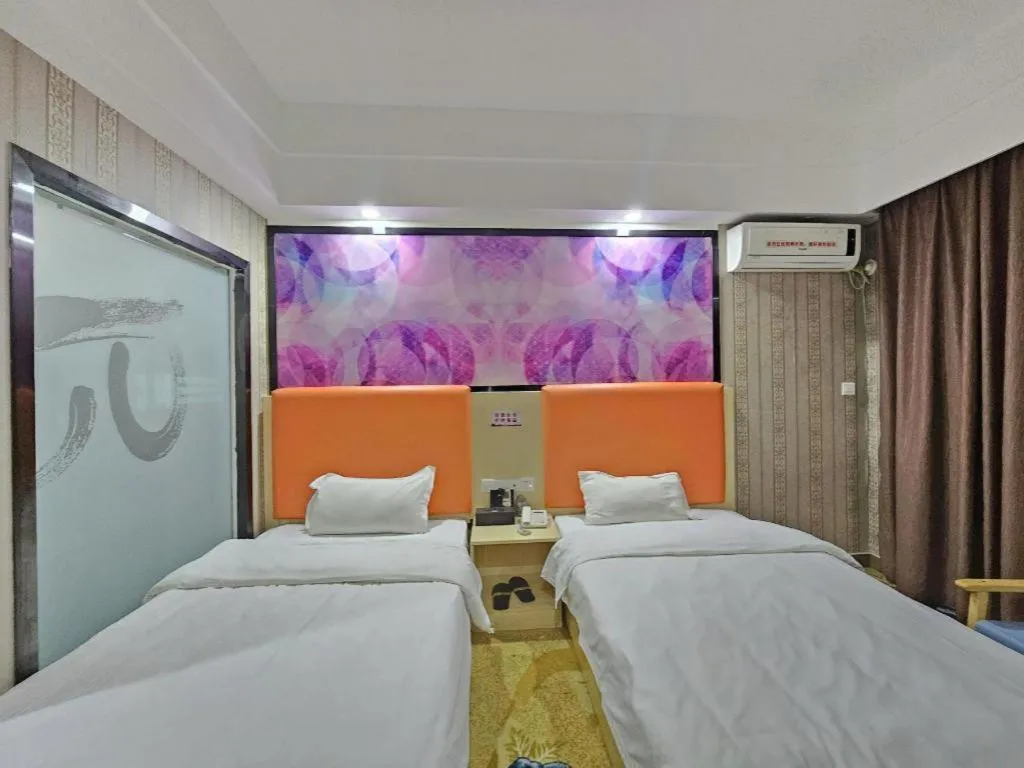 Bed in PAI Hotel·Huazhou Bus Terminal