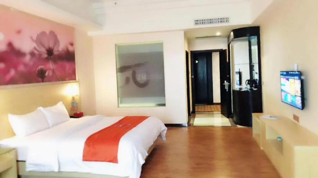 Bed in PAI Hotel·Huazhou Bus Terminal