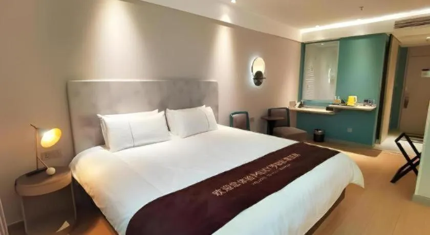 Bed in Magnotel Hotel Shiyan Wuyan Pedestrian Street