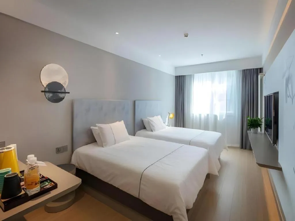 Bed in Magnotel Hotel Shiyan Wuyan Pedestrian Street