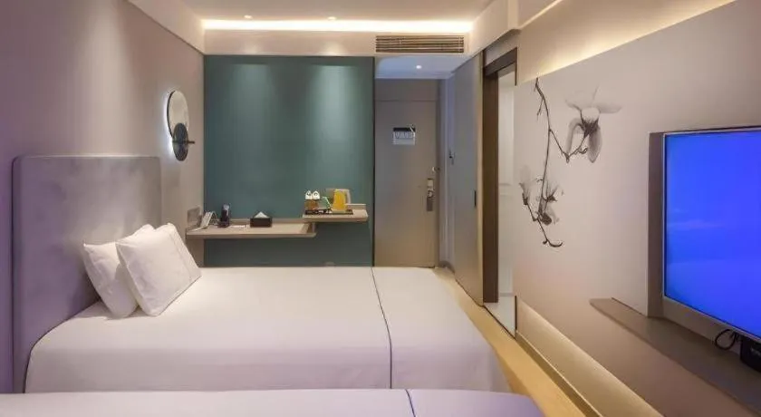 Bed in Magnotel Hotel Shiyan Wuyan Pedestrian Street