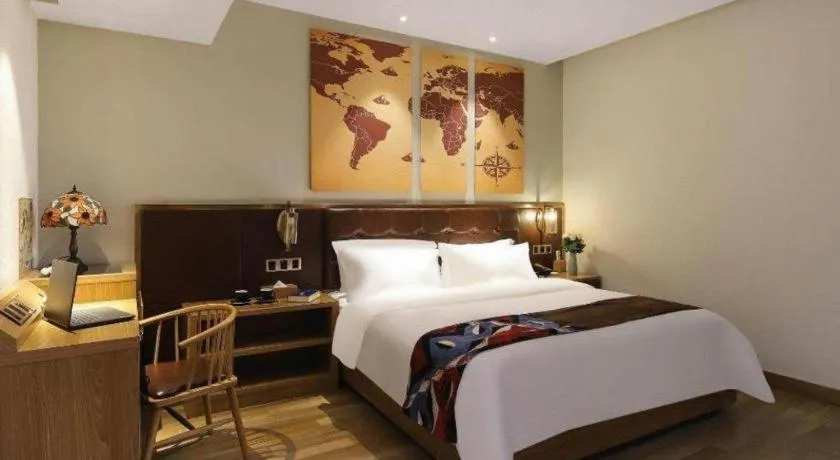 Bed in James Joyce Coffetel Zhengzhou CBD Exhibition Center Provincial People's Hospital