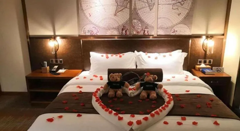 Bed in James Joyce Coffetel Zhengzhou CBD Exhibition Center Provincial People's Hospital