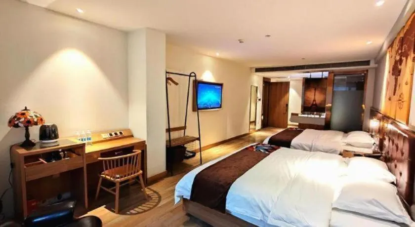 Bed in James Joyce Coffetel Zhengzhou CBD Exhibition Center Provincial People's Hospital