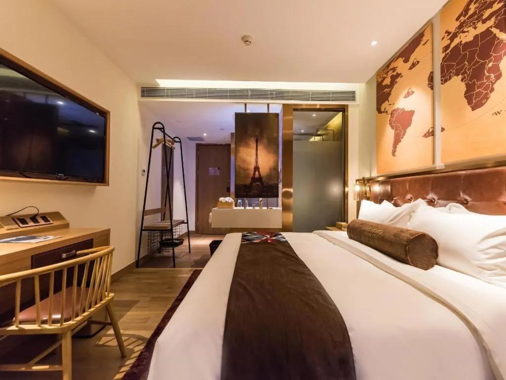 Bed in James Joyce Coffetel Zhengzhou CBD Exhibition Center Provincial People's Hospital