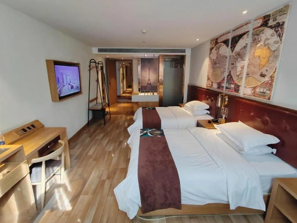 Bed in James Joyce Coffetel Zhengzhou CBD Exhibition Center Provincial People's Hospital