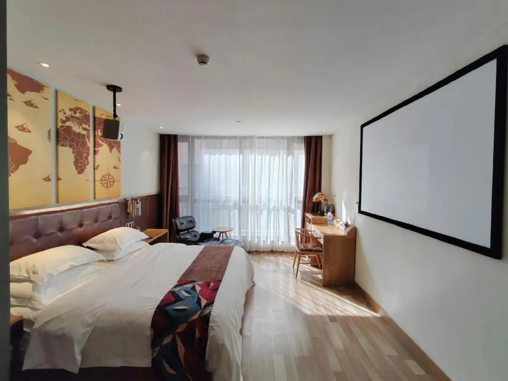 Bed in James Joyce Coffetel Zhengzhou CBD Exhibition Center Provincial People's Hospital