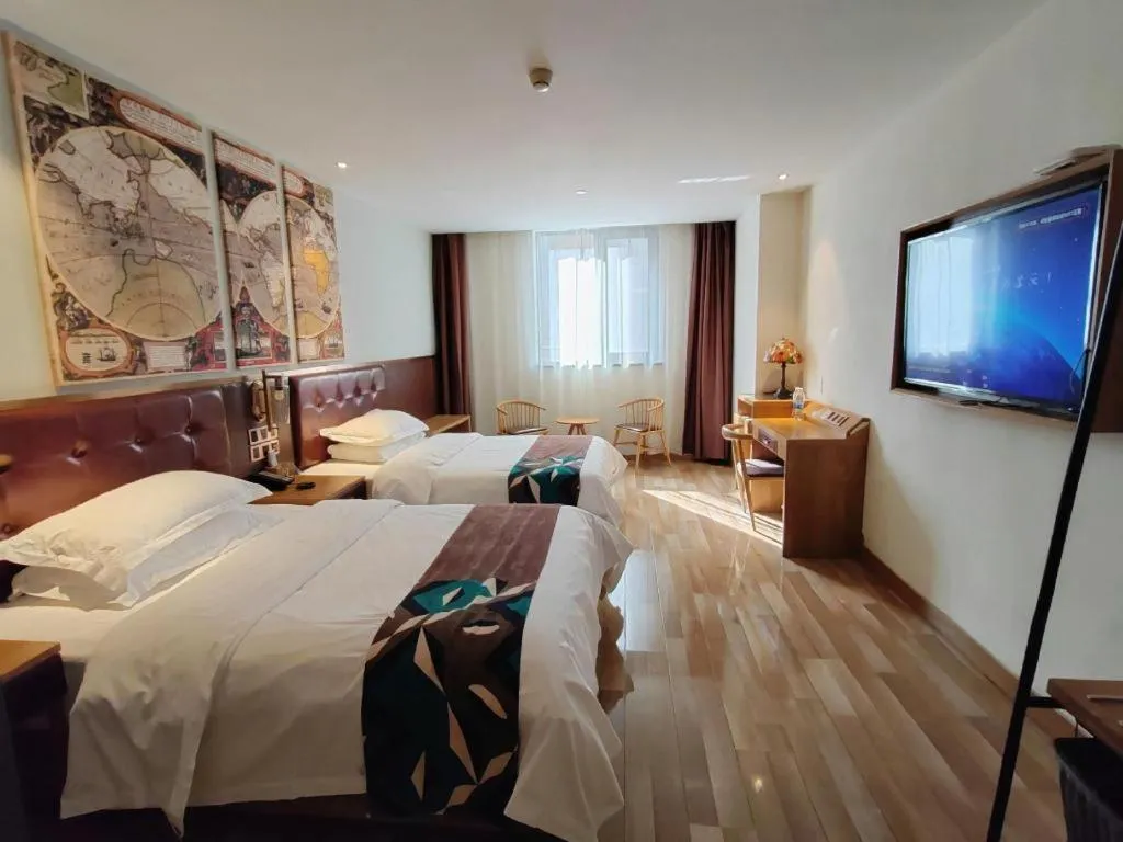 Bed in James Joyce Coffetel Zhengzhou CBD Exhibition Center Provincial People's Hospital