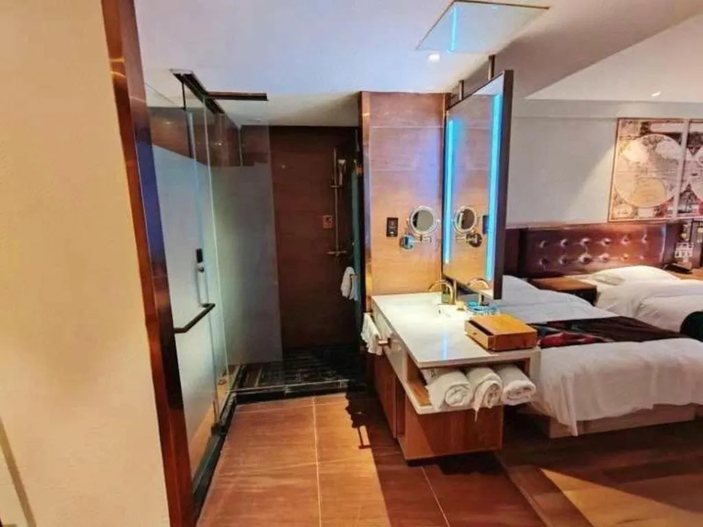 Bed in James Joyce Coffetel Zhengzhou CBD Exhibition Center Provincial People's Hospital