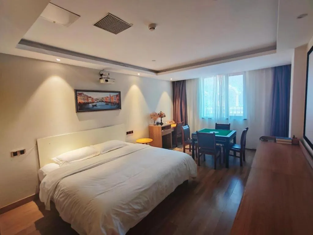 Bed in James Joyce Coffetel Zhengzhou CBD Exhibition Center Provincial People's Hospital