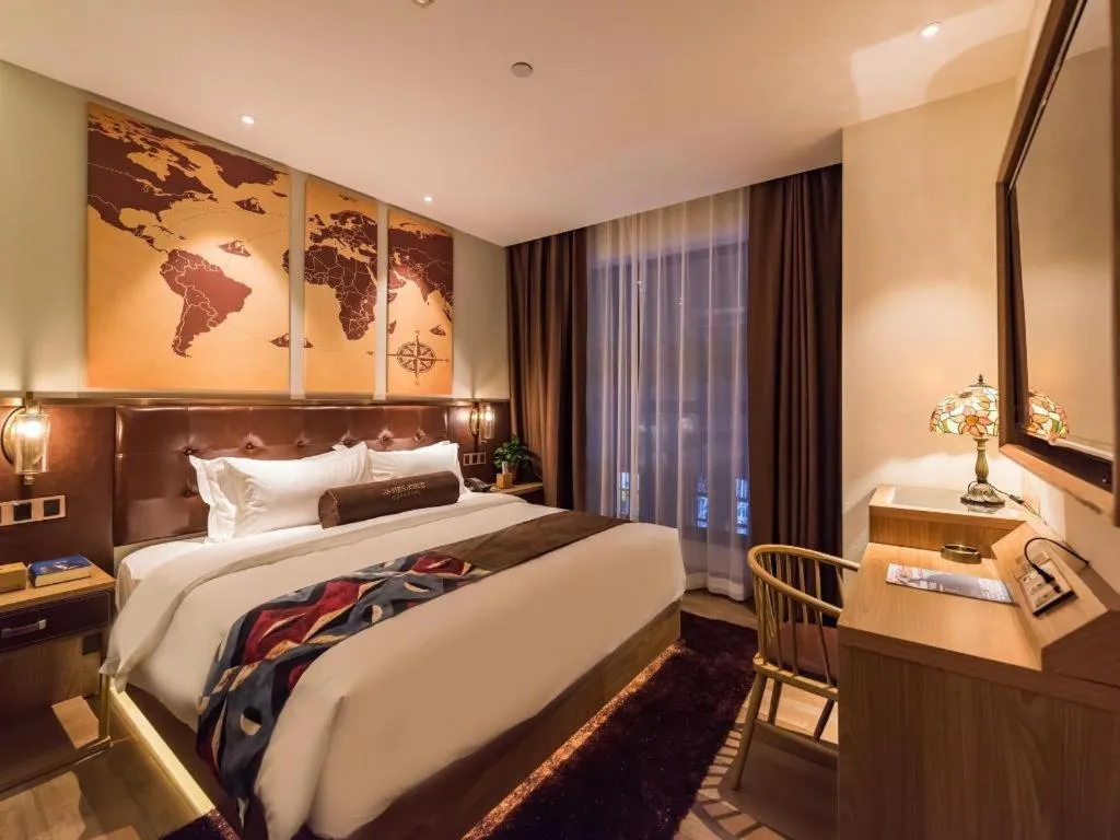 Bed in James Joyce Coffetel Zhengzhou CBD Exhibition Center Provincial People's Hospital