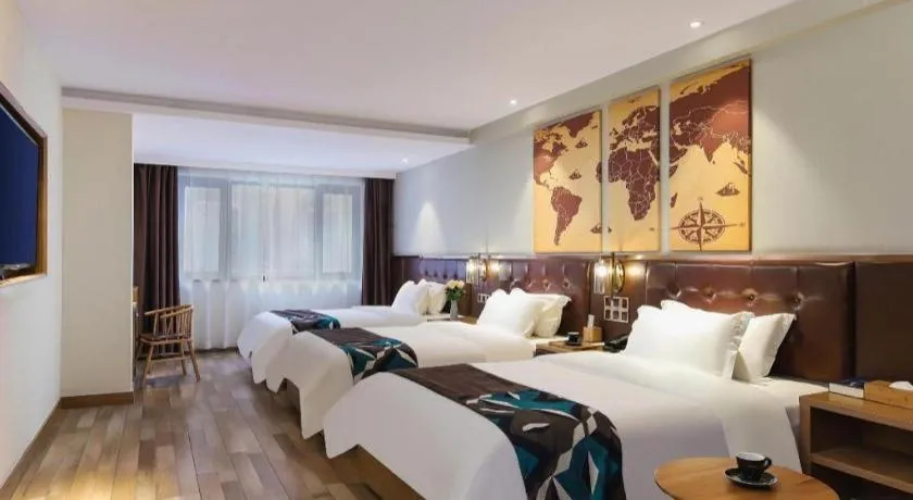 Bed in James Joyce Coffetel Zhengzhou CBD Exhibition Center Provincial People's Hospital