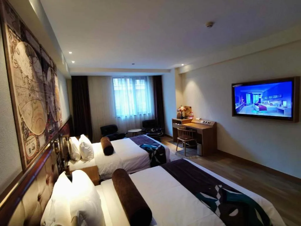 Bed in James Joyce Coffetel Zhengzhou CBD Exhibition Center Provincial People's Hospital