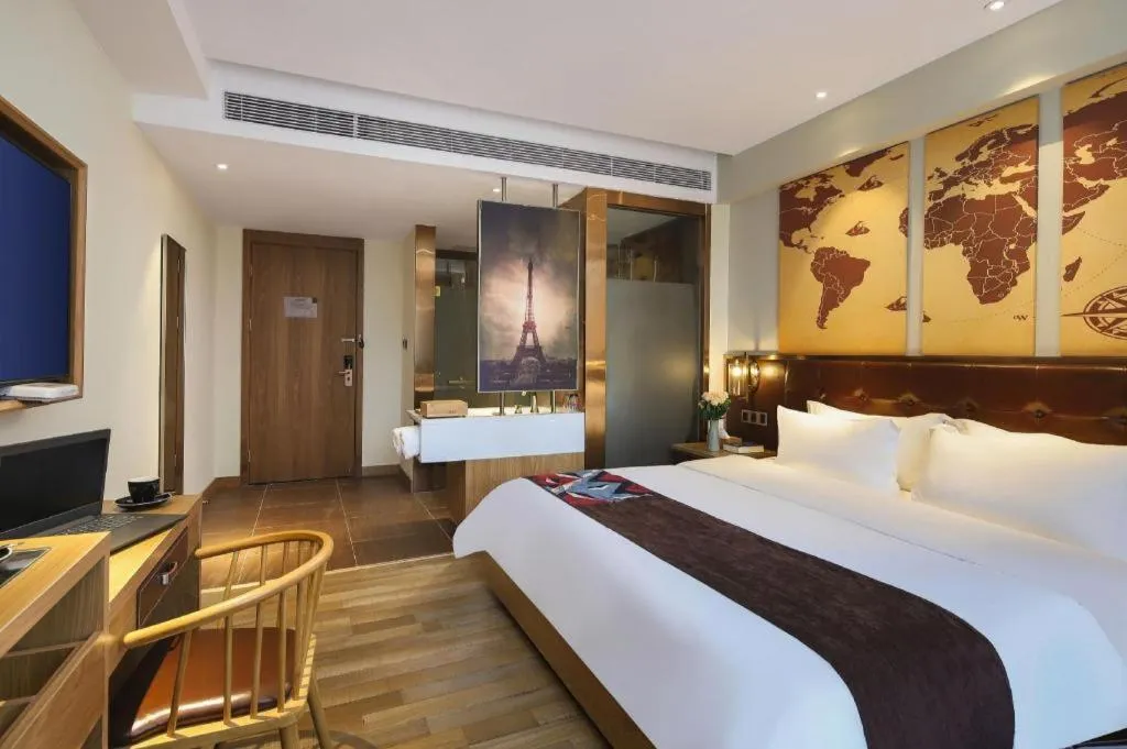 Bed in James Joyce Coffetel Zhengzhou CBD Exhibition Center Provincial People's Hospital