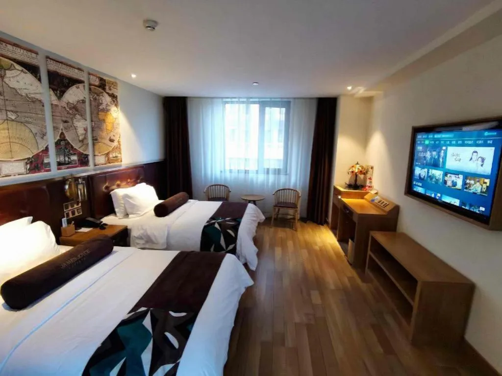 Bed in James Joyce Coffetel Zhengzhou CBD Exhibition Center Provincial People's Hospital