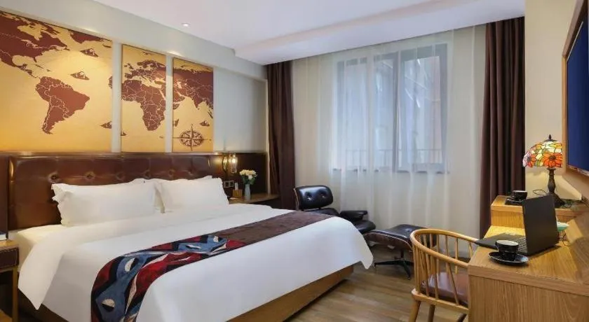 Bed in James Joyce Coffetel Zhengzhou CBD Exhibition Center Provincial People's Hospital