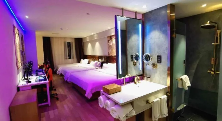 Bed in James Joyce Coffetel Zhengzhou CBD Exhibition Center Provincial People's Hospital