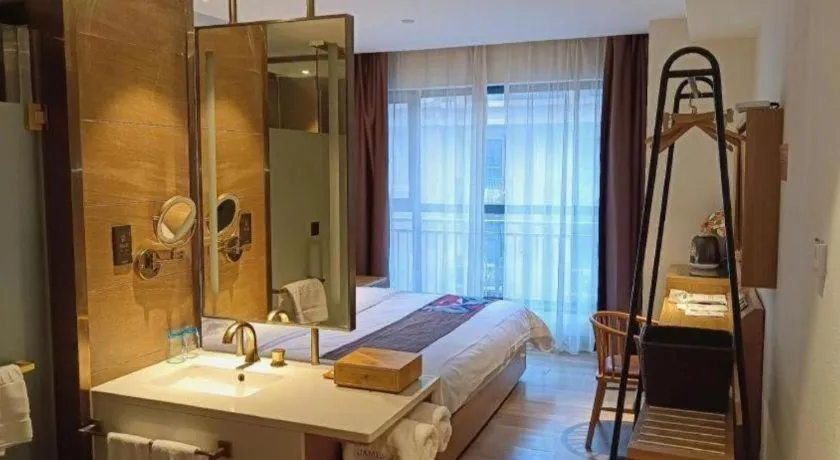 Bed in James Joyce Coffetel Zhengzhou CBD Exhibition Center Provincial People's Hospital