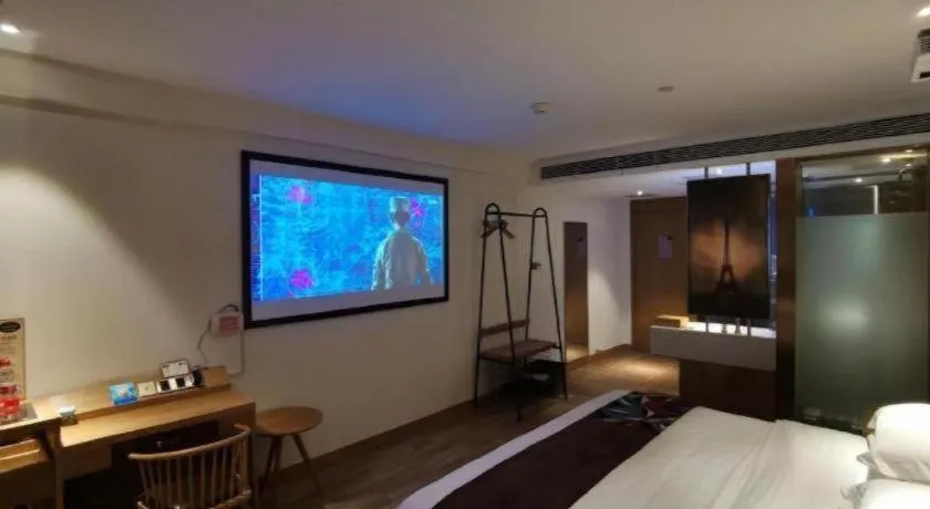 Bed in James Joyce Coffetel Zhengzhou CBD Exhibition Center Provincial People's Hospital