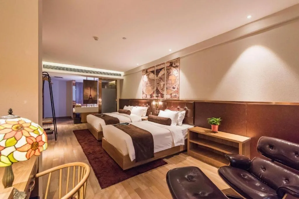 Bed in James Joyce Coffetel Zhengzhou CBD Exhibition Center Provincial People's Hospital