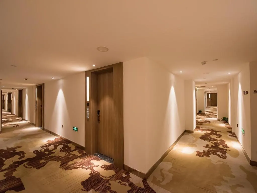 Bed in James Joyce Coffetel Zhengzhou CBD Exhibition Center Provincial People's Hospital