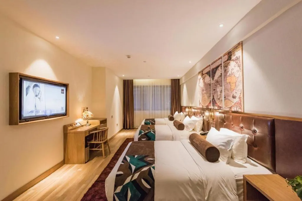 Bed in James Joyce Coffetel Zhengzhou CBD Exhibition Center Provincial People's Hospital