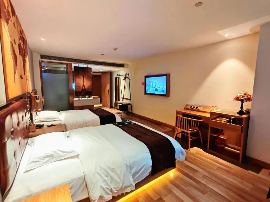 Bed in James Joyce Coffetel Zhengzhou CBD Exhibition Center Provincial People's Hospital