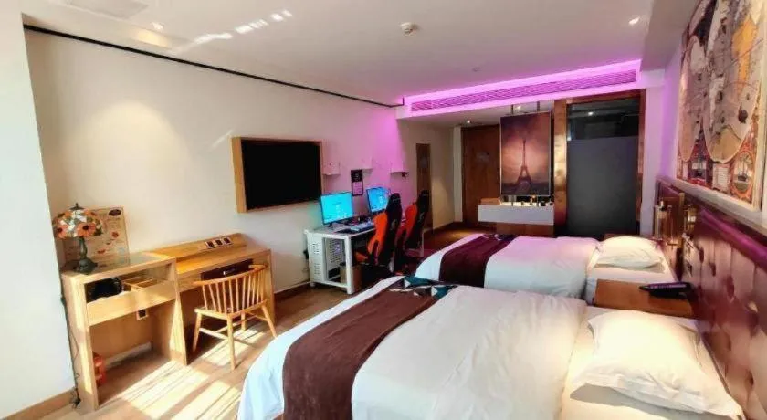 Bed in James Joyce Coffetel Zhengzhou CBD Exhibition Center Provincial People's Hospital