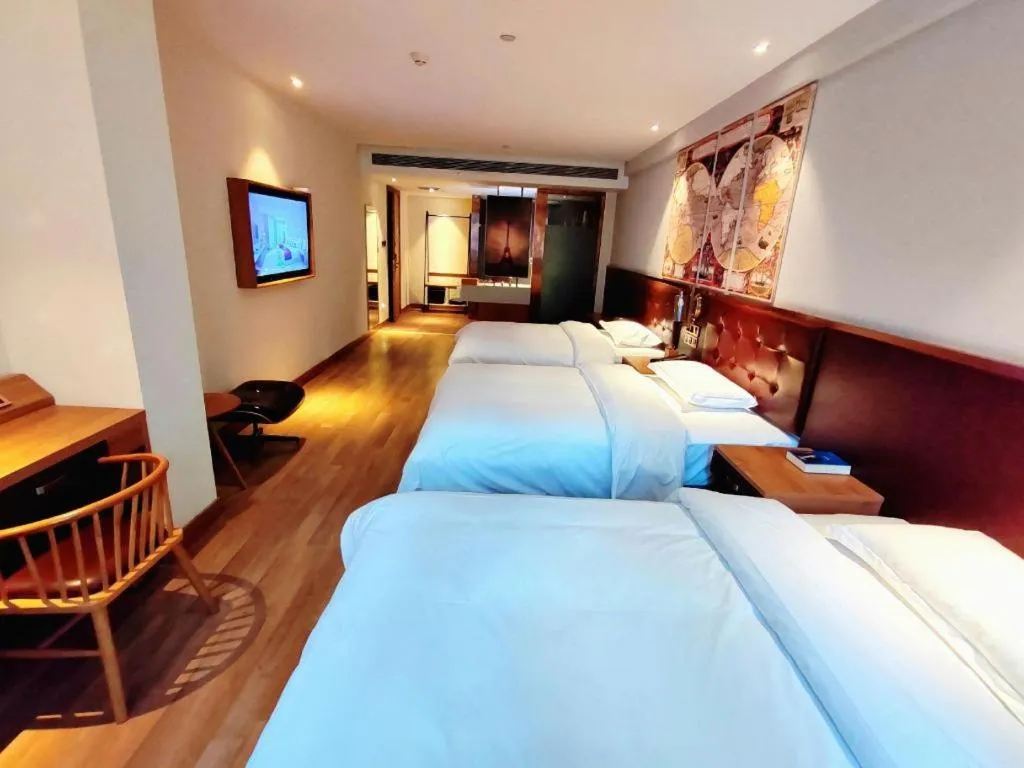 Bed in James Joyce Coffetel Zhengzhou CBD Exhibition Center Provincial People's Hospital