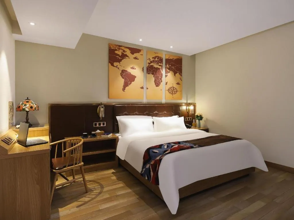 Bed in James Joyce Coffetel Zhengzhou CBD Exhibition Center Provincial People's Hospital