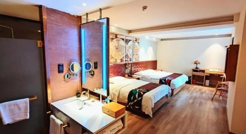Bed in James Joyce Coffetel Zhengzhou CBD Exhibition Center Provincial People's Hospital